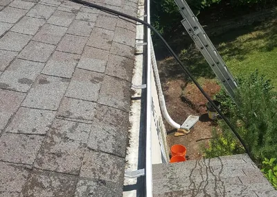 After cleaning — the gutter emptied and flowing free