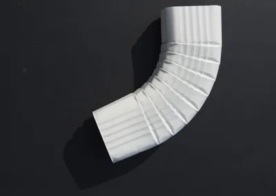 White aluminum B elbow downspout fitting
