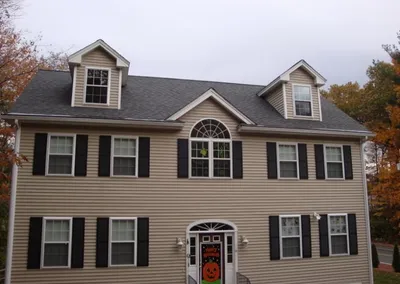 Two-story colonial with Gutter Cap along every roofline