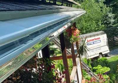Underside view of Gutter Cap along a porch edge