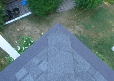 Looking down the roof peak of a home fitted with Gutter Roof