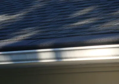 Close view of Gutter Roof along a sunlit eave