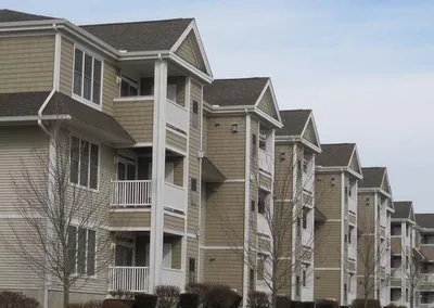 Gutter installation at a three-story condo building